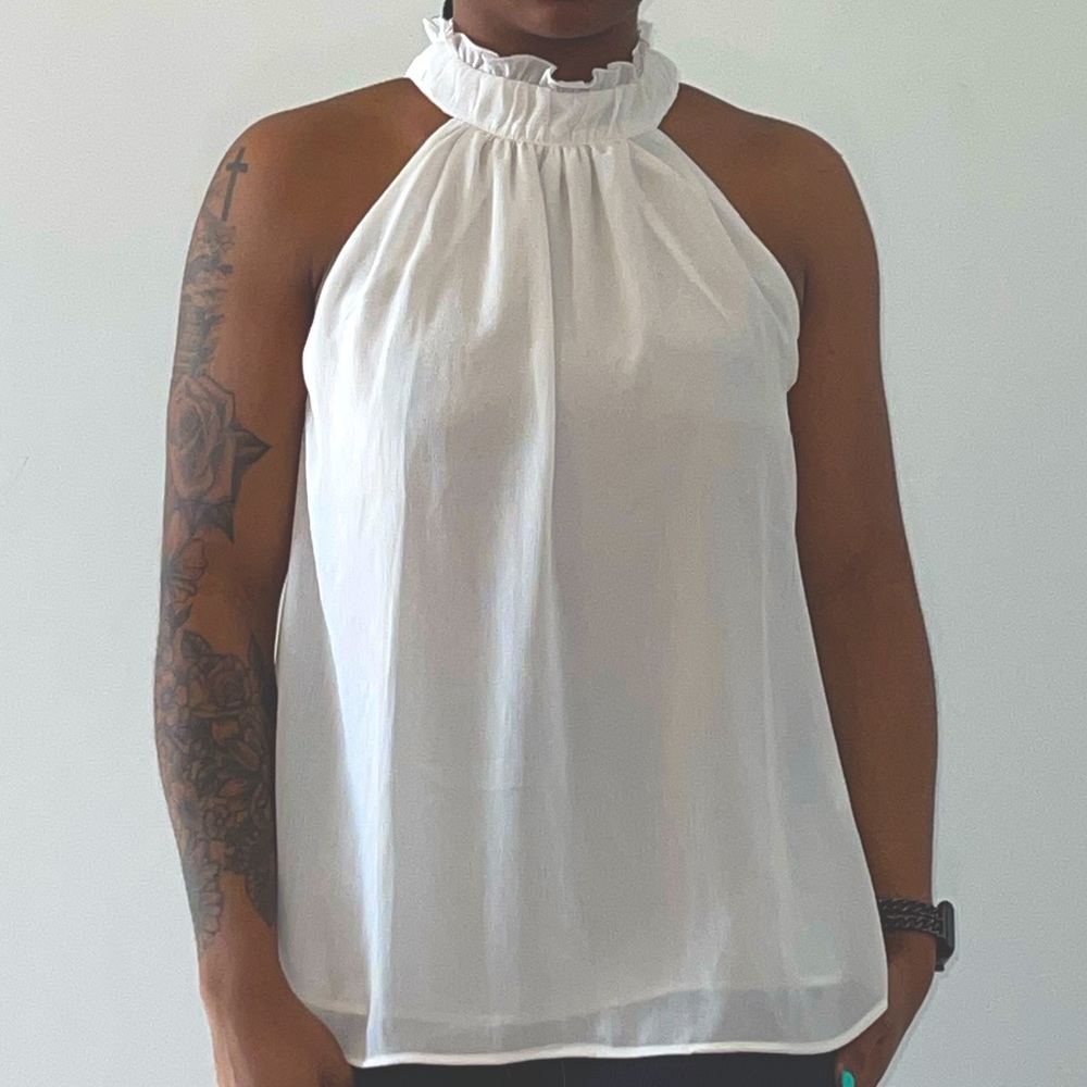 Casual white blouse with cute ruffled neck piece